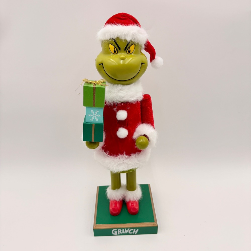 Dr Seuss The Grinch Christmas Nutcracker Holiday Santa Suit Holding Gifts 15"